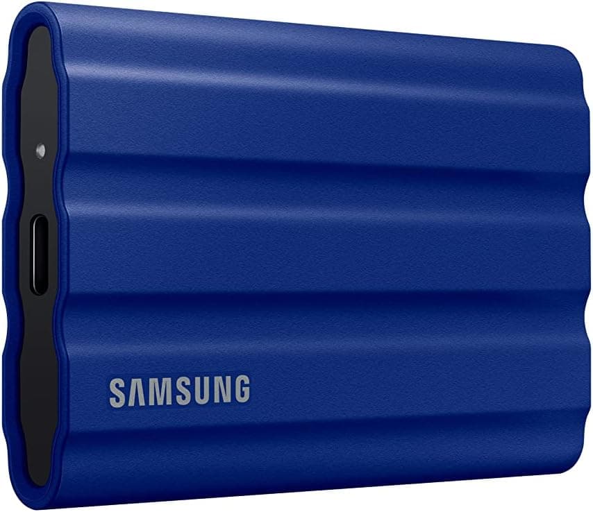 Blue Samsung T7 Shield portable SSD on a white background.